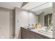 Bright bathroom with dual sinks, modern vanity, and spacious mirror, enhancing the space at 15812 Joliet Rd, Westfield, IN 46074