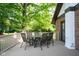 Backyard deck features outdoor seating, table and wooded views at 15812 Joliet Rd, Westfield, IN 46074