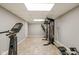 Spacious home gym equipped with various fitness machines for a complete workout routine at 15812 Joliet Rd, Westfield, IN 46074