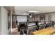 Finished basement home theater featuring a projector, screen, bar, cabinets, and leather seating at 15812 Joliet Rd, Westfield, IN 46074