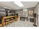 Finished basement features a home theater with a screen, projector, leather seats and a bar at 15812 Joliet Rd, Westfield, IN 46074