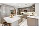 Well-lit kitchen with gray cabinetry, large island and stainless appliances at 15812 Joliet Rd, Westfield, IN 46074