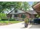 Outdoor patio with brick exterior, landscaping, patio furniture, and a cozy atmosphere at 15812 Joliet Rd, Westfield, IN 46074