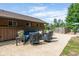 A patio with outdoor seating features stylish furniture and a well-maintained yard at 15812 Joliet Rd, Westfield, IN 46074