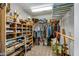 Spacious walk-in closet with built-in shelving and hanging rods for ample storage at 15812 Joliet Rd, Westfield, IN 46074