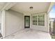 Covered back patio with plenty of space for seating and enjoyment at 1631 Wilford Ln, Indianapolis, IN 46229