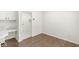 Versatile flex room with built-in desk and view into a hallway at 1631 Wilford Ln, Indianapolis, IN 46229