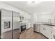 Bright eat-in kitchen features stainless steel appliances and modern countertops at 1631 Wilford Ln, Indianapolis, IN 46229