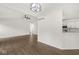 Bright and spacious living room with hardwood floors and open layout to the kitchen at 1631 Wilford Ln, Indianapolis, IN 46229