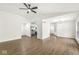 Large living room featuring hardwood floors, high ceilings, and an open layout at 1631 Wilford Ln, Indianapolis, IN 46229