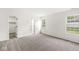 Spacious bedroom featuring large windows allowing for ample natural light at 1631 Wilford Ln, Indianapolis, IN 46229