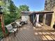 Spacious outdoor deck featuring a dining table, chairs, and an attached sunroom perfect for relaxation at 177 Wellington Pkwy, Noblesville, IN 46060