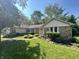A well-maintained home with stone accents, trimmed bushes and a healthy, green lawn at 177 Wellington Pkwy, Noblesville, IN 46060