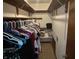 Spacious walk-in closet offering ample storage, with shelving and hanging rods for organization at 177 Wellington Pkwy, Noblesville, IN 46060