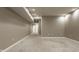 Spacious finished basement with neutral carpet and recessed lighting at 2016 Central Ave, Indianapolis, IN 46202