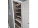 Pantry with shelving and neutral gray walls at 2035 S Pennsylvania St, Indianapolis, IN 46225