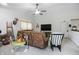 Inviting living room with a neutral color palette, comfortable seating, and a ceiling fan at 2145 W Autumn Ln, Columbus, IN 47201
