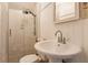 Fresh bathroom with tiled walk-in shower and updated fixtures at 224 N Pennsylvania St, Greenfield, IN 46140
