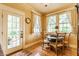Cozy breakfast nook features abundant natural light and seating for four at 224 N Pennsylvania St, Greenfield, IN 46140
