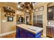 Spacious kitchen with a center island, stainless steel fridge, and views of the dining area at 224 N Pennsylvania St, Greenfield, IN 46140
