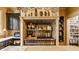 Professional-grade range, custom shelving, and butcher block island in this gourmet kitchen at 224 N Pennsylvania St, Greenfield, IN 46140