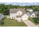 Aerial view of two-story home featuring a combination of brick and vinyl siding in a suburban neighborhood at 2326 Gradison Cir, Indianapolis, IN 46214