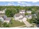 Aerial view of a two-story home, in a lush, green, and established neighborhood at 2326 Gradison Cir, Indianapolis, IN 46214