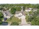 Aerial view of two-story home featuring a combination of brick and vinyl siding in a wooded suburban neighborhood at 2326 Gradison Cir, Indianapolis, IN 46214