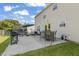 Well-equipped patio for outdoor entertaining, includes trampoline, seating, and grill at 2326 Gradison Cir, Indianapolis, IN 46214