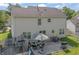 This home features a lovely backyard with a patio, furniture, and a trampoline at 2326 Gradison Cir, Indianapolis, IN 46214