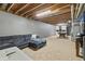 Large basement with a comfortable sectional and a pool table for recreation at 2326 Gradison Cir, Indianapolis, IN 46214
