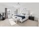 Bright and airy bedroom with ample natural light, a ceiling fan, and a modern bedroom set at 2326 Gradison Cir, Indianapolis, IN 46214