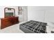 Cozy bedroom with plush carpet, a modern bed, and dresser providing ample storage at 2326 Gradison Cir, Indianapolis, IN 46214