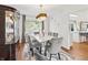 Bright dining room with a modern chandelier and comfortable seating at 2326 Gradison Cir, Indianapolis, IN 46214