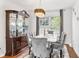 Elegant dining room with stylish lighting and seating for six at 2326 Gradison Cir, Indianapolis, IN 46214