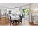 Open floor plan showing kitchen with backyard access and dining area at 2326 Gradison Cir, Indianapolis, IN 46214