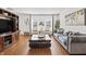 Spacious living room with large TV and comfortable seating at 2326 Gradison Cir, Indianapolis, IN 46214