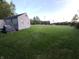 Expansive backyard offering plenty of room and a view of the adjacent baseball field from the rear at 2710 W State Road 38, Sheridan, IN 46069