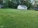 Charming home with a large front lawn and ample parking space; great curb appeal at 2710 W State Road 38, Sheridan, IN 46069