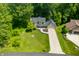 Stunning aerial view of the landscaped property and verdant surroundings with mature trees at 2805 Fox E Ct, Martinsville, IN 46151