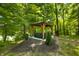 Backyard gazebo for serene relaxation amidst lush greenery and natural beauty at 2805 Fox E Ct, Martinsville, IN 46151