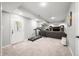 Finished basement area with neutral walls, a door to the outside, and exercise equipment at 2805 Fox E Ct, Martinsville, IN 46151