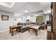 Spacious basement with plush gray sectional sofa, perfect for relaxing and entertaining at 2805 Fox E Ct, Martinsville, IN 46151