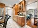 Kitchen with ample counter space, pantry and adjacent dining area with natural light at 2805 Fox E Ct, Martinsville, IN 46151