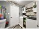 Well-organized laundry room with modern appliances, storage cabinets, and decorative accents for added style at 2805 Fox E Ct, Martinsville, IN 46151