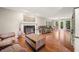 Spacious living room featuring hardwood floors, fireplace, and neutral paint at 2805 Fox E Ct, Martinsville, IN 46151
