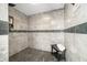 Spacious tiled shower with gray accent tiles and black hardware at 2805 Fox E Ct, Martinsville, IN 46151