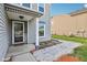 Cozy front porch with a welcome mat, charming decor, and a tidy walkway at 2887 Ludwig Dr, Indianapolis, IN 46239