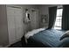 Serene bedroom features a comfortable bed, soft lighting, and neutral decor, creating a peaceful and relaxing atmosphere at 29 Home Ave, Markleville, IN 46056