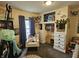 Cozy bedroom with creative storage, plush carpeting, a charming play area, and abundant natural light, perfect for relaxation at 29 Home Ave, Markleville, IN 46056